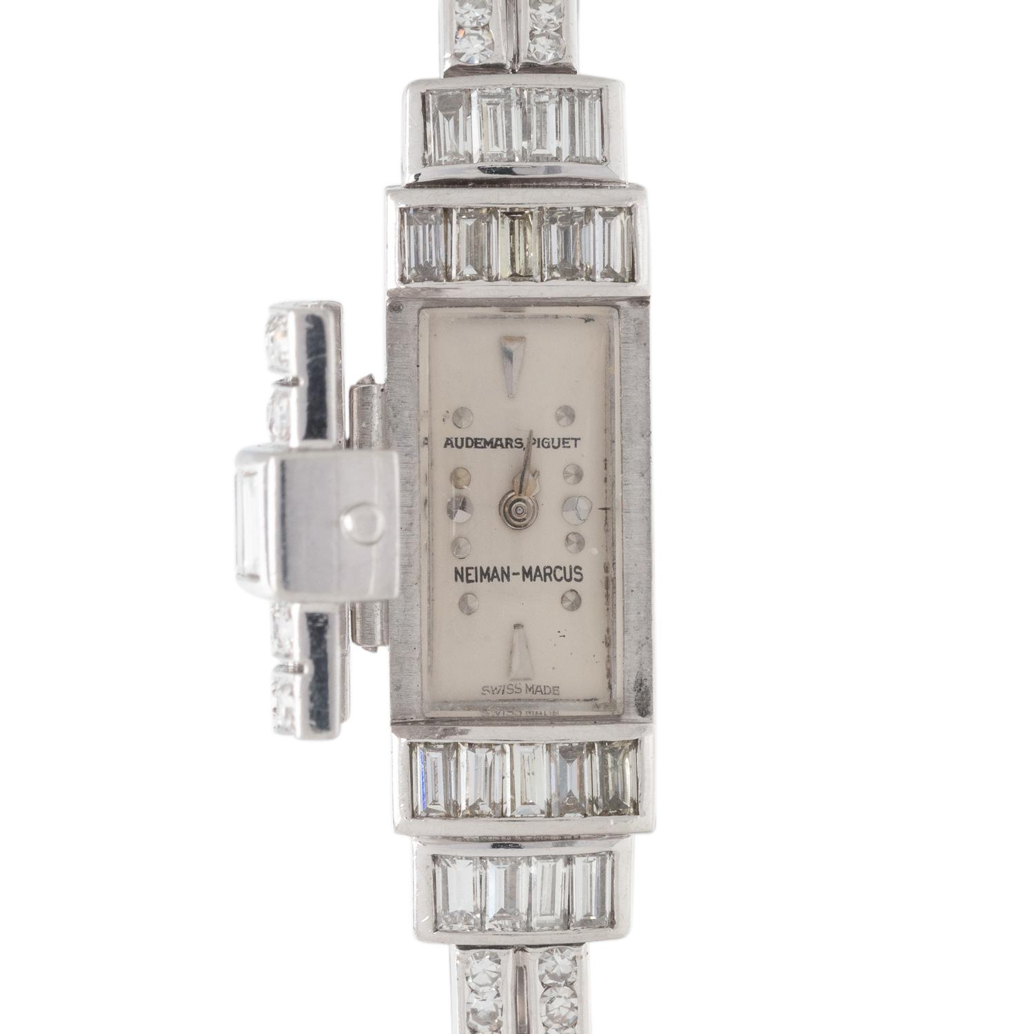 AUDEMARS PIGUET, PLATINUM AND DIAMOND SURPRISE WRISTWATCH