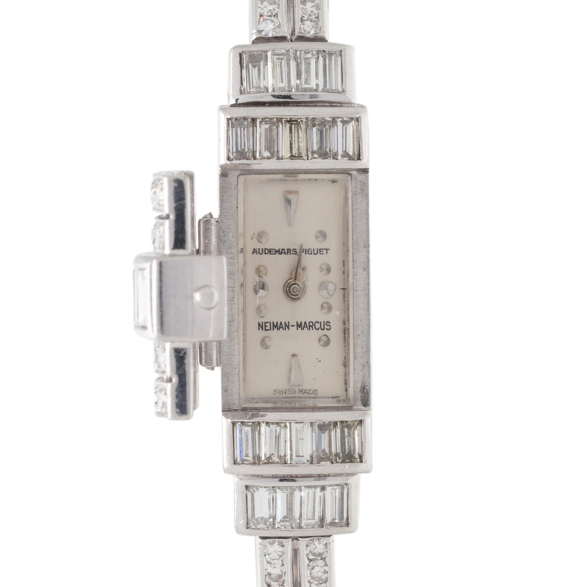AUDEMARS PIGUET, PLATINUM AND DIAMOND SURPRISE WRISTWATCH