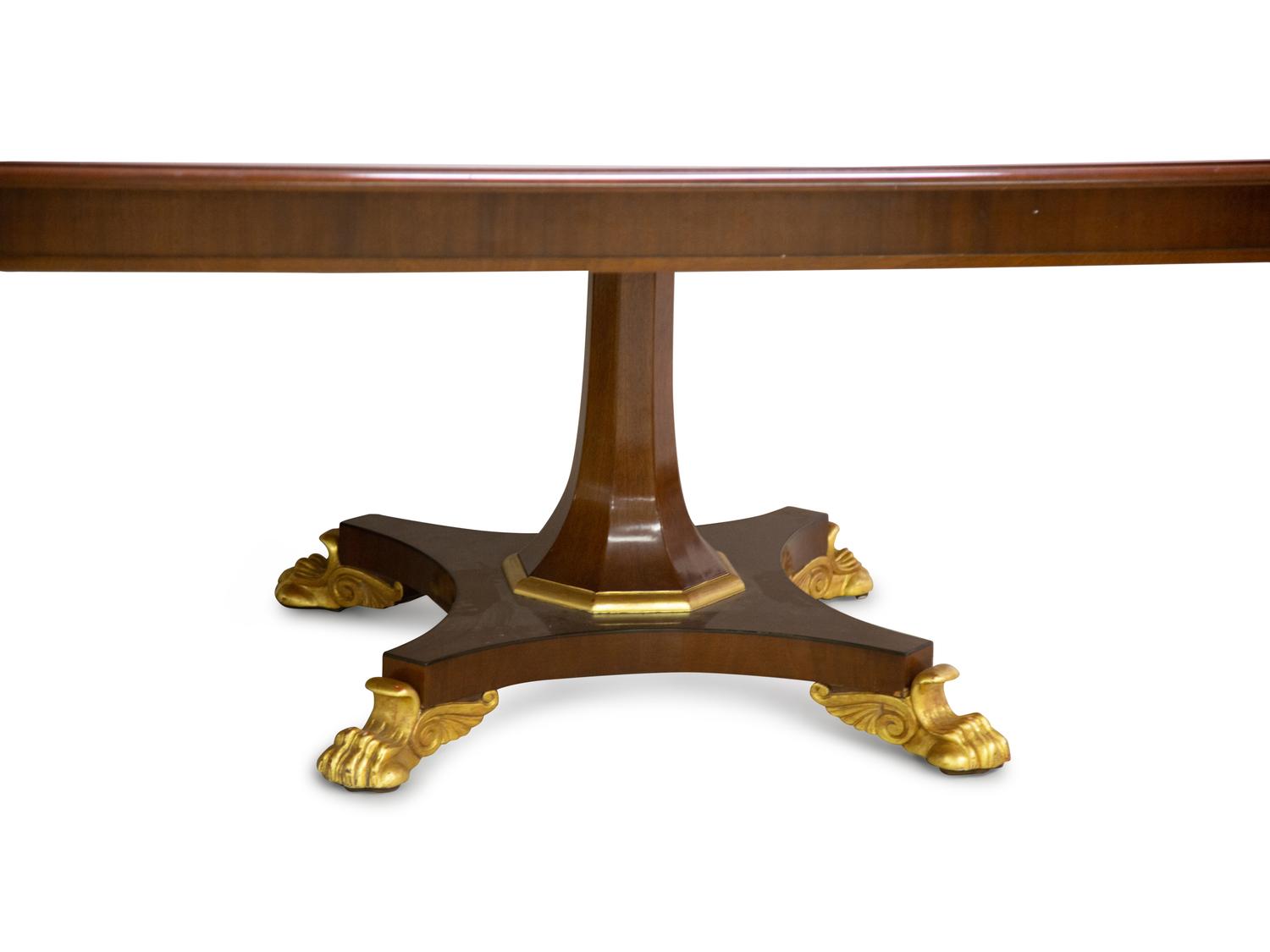 A Regency Style Mahogany and Parcel Gilt Twin Pedestal Dining Table — 20th Century