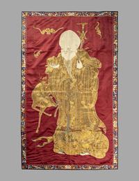 A Large Chinese Red Ground Embroidered Silk 'Longevity' Panel