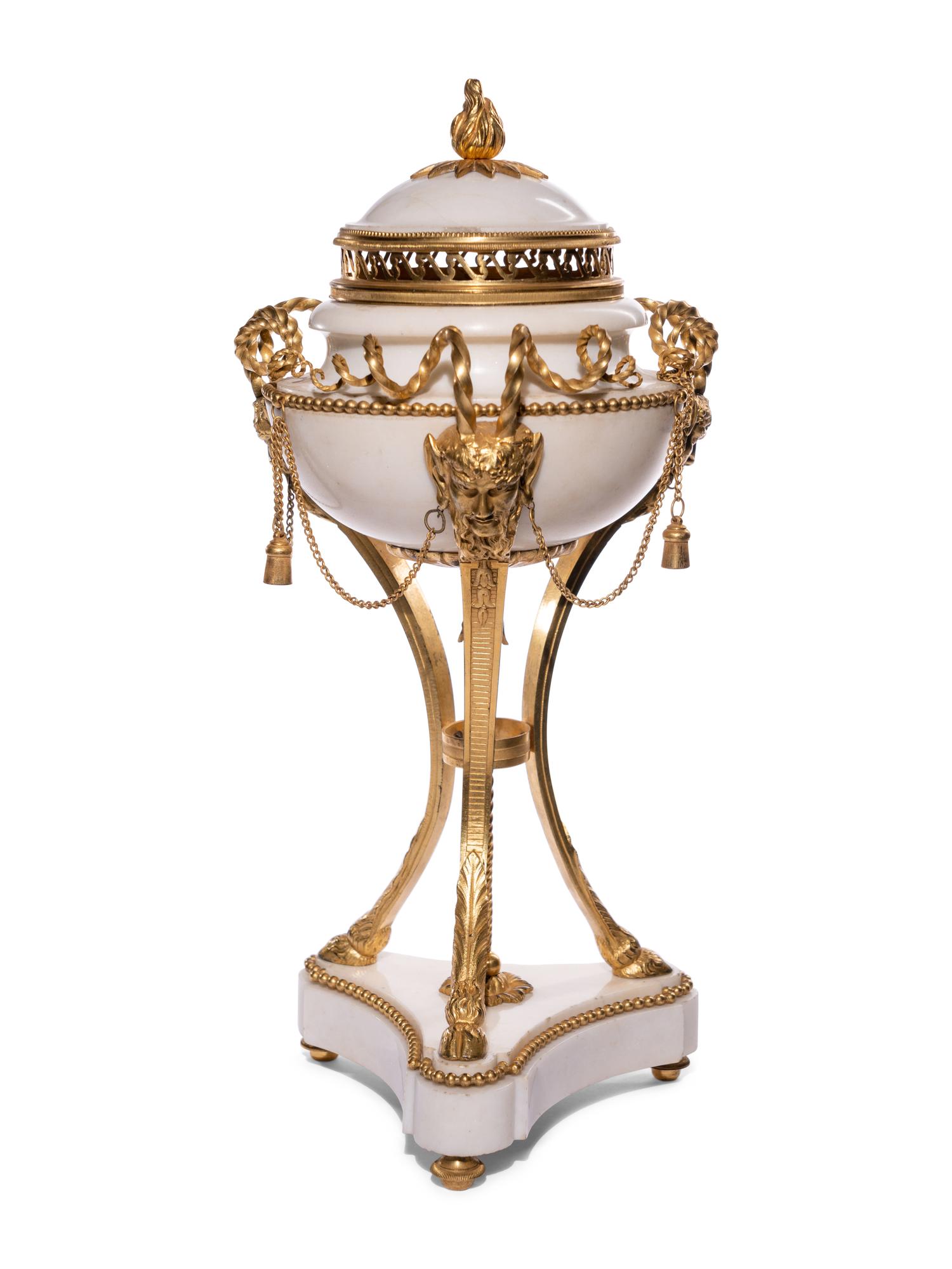 A Pair of Late Louis XVI Gilt Bronze Mounted White Marble Cassolettes