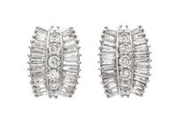 A Pair of Platinum and Diamond Earclips, 14.10 dwts.