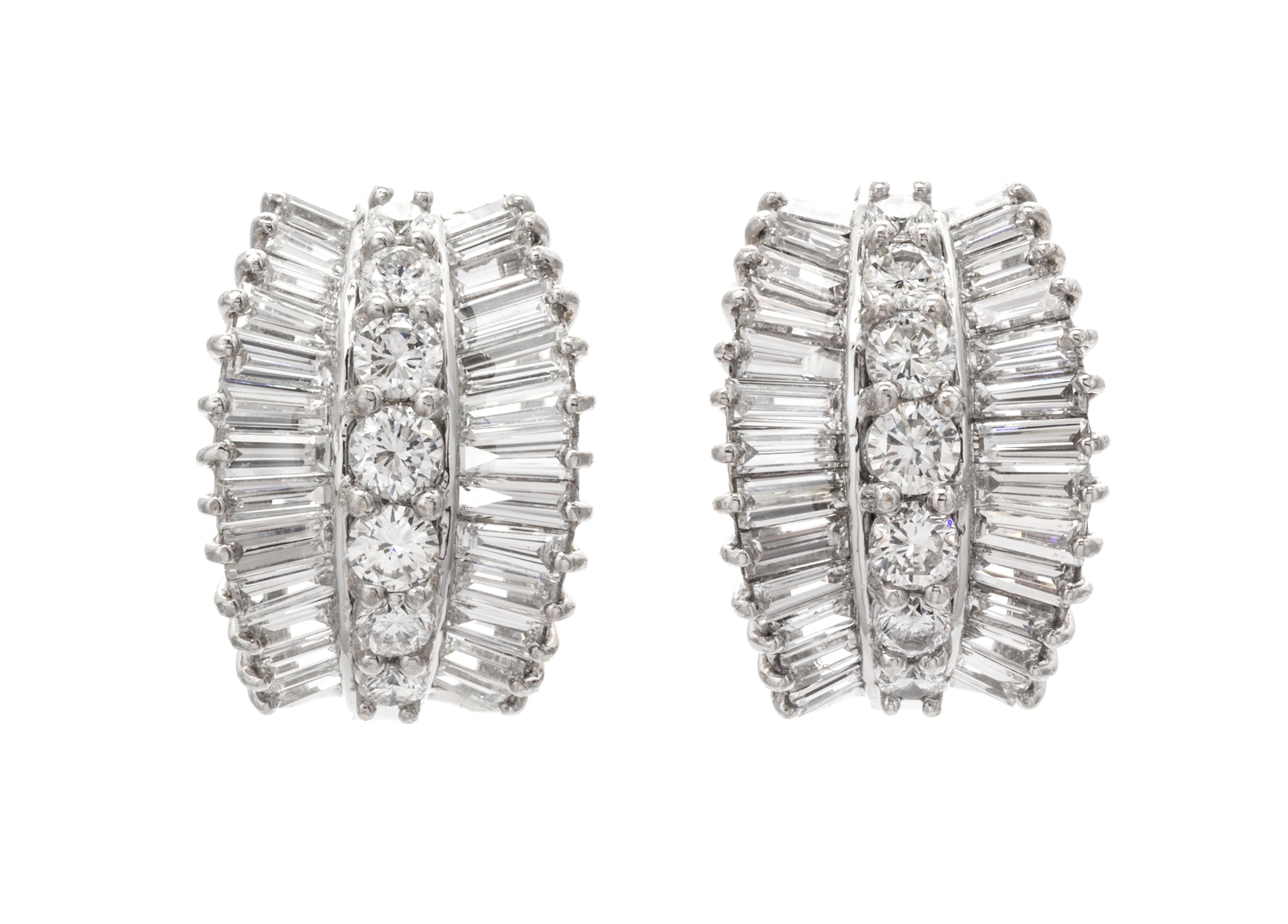 A Pair of Platinum and Diamond Earclips, 14.10 dwts.