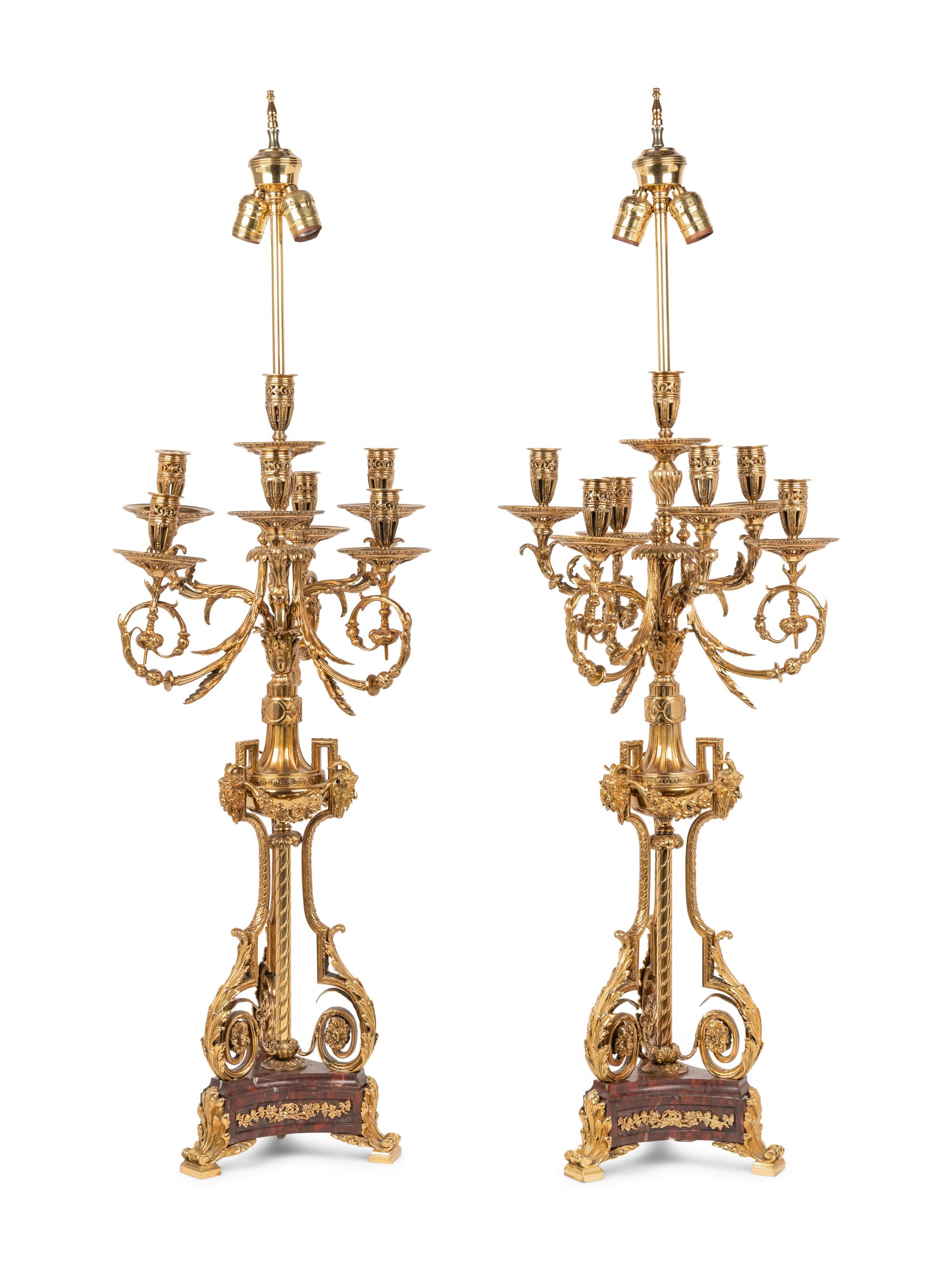 A Pair of Louis XVI Style Gilt Metal and Marble Seven-Light Candelabra Mounted as Lamps