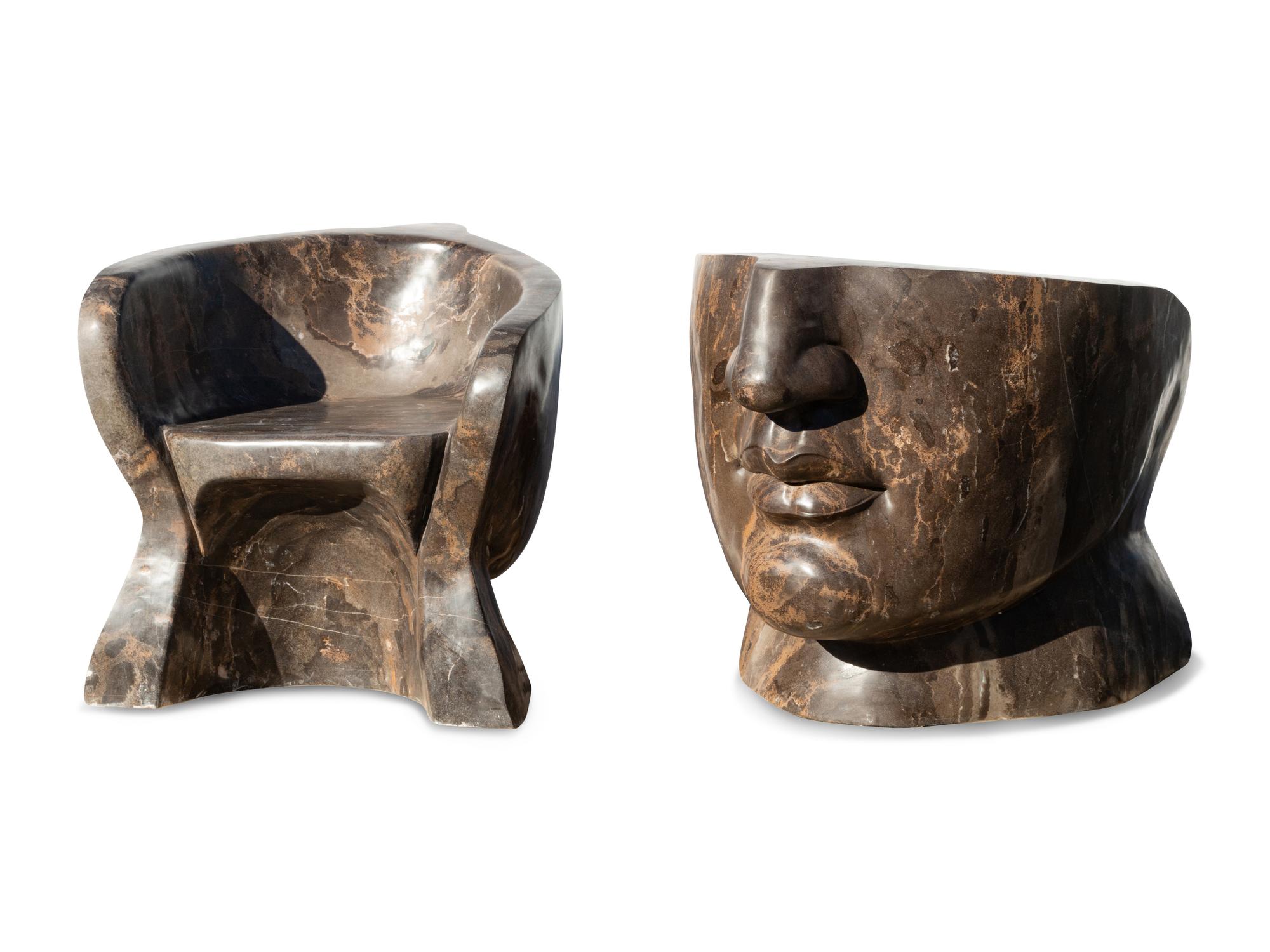 A Pair of Italian Carved Marble "Face" Chairs