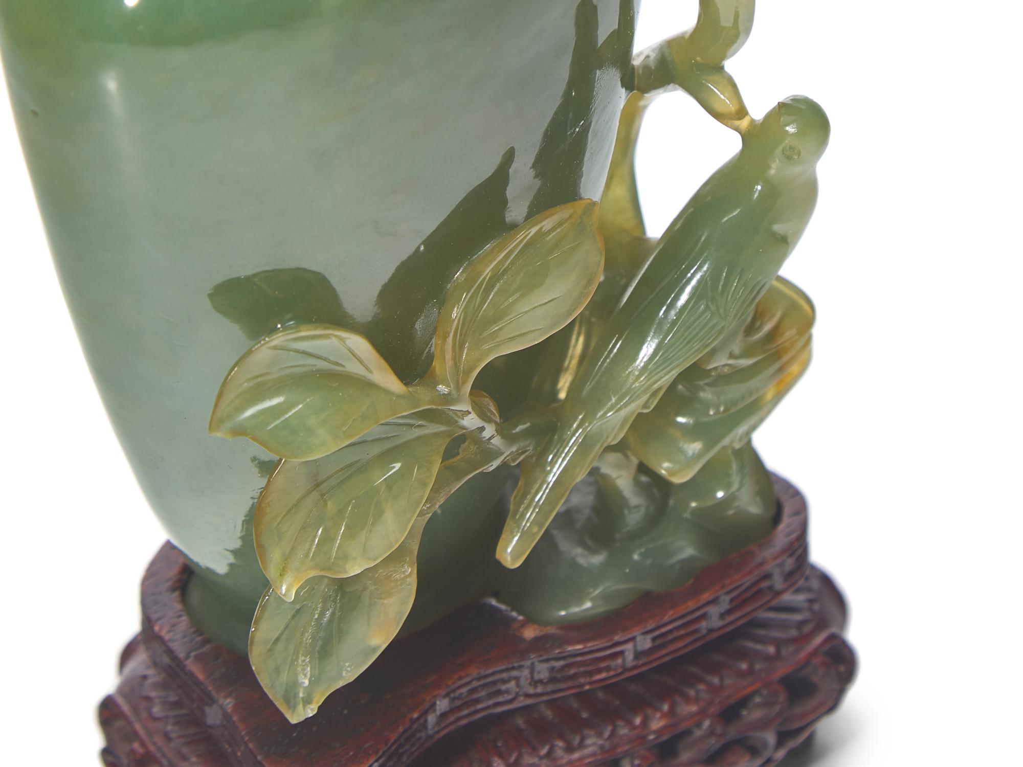 A Chinese Carved Celadon Hardstone "Bird and Fruits" Flower Vase and Cover