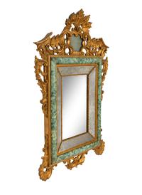 An Italian Baroque Style Giltwood and Simulated Marble-Painted Mirror