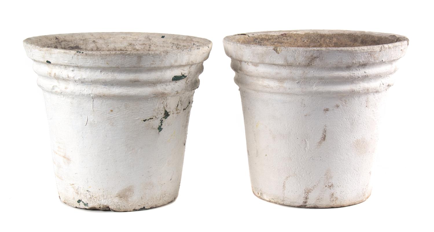 A Group of Five Concrete Planters Height of larger 15 1/2 inches x diameter 21 inches.