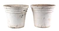 A Group of Five Concrete Planters Height of larger 15 1/2 inches x diameter 21 inches.