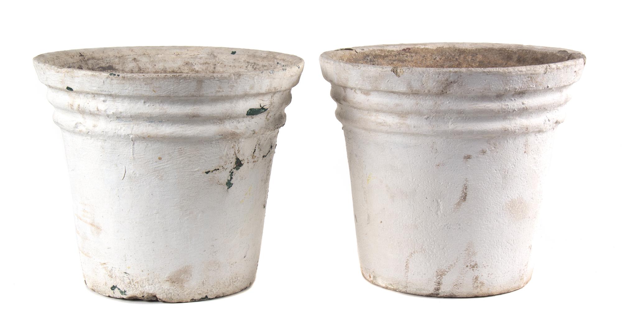 A Group of Five Concrete Planters Height of larger 15 1/2 inches x diameter 21 inches.