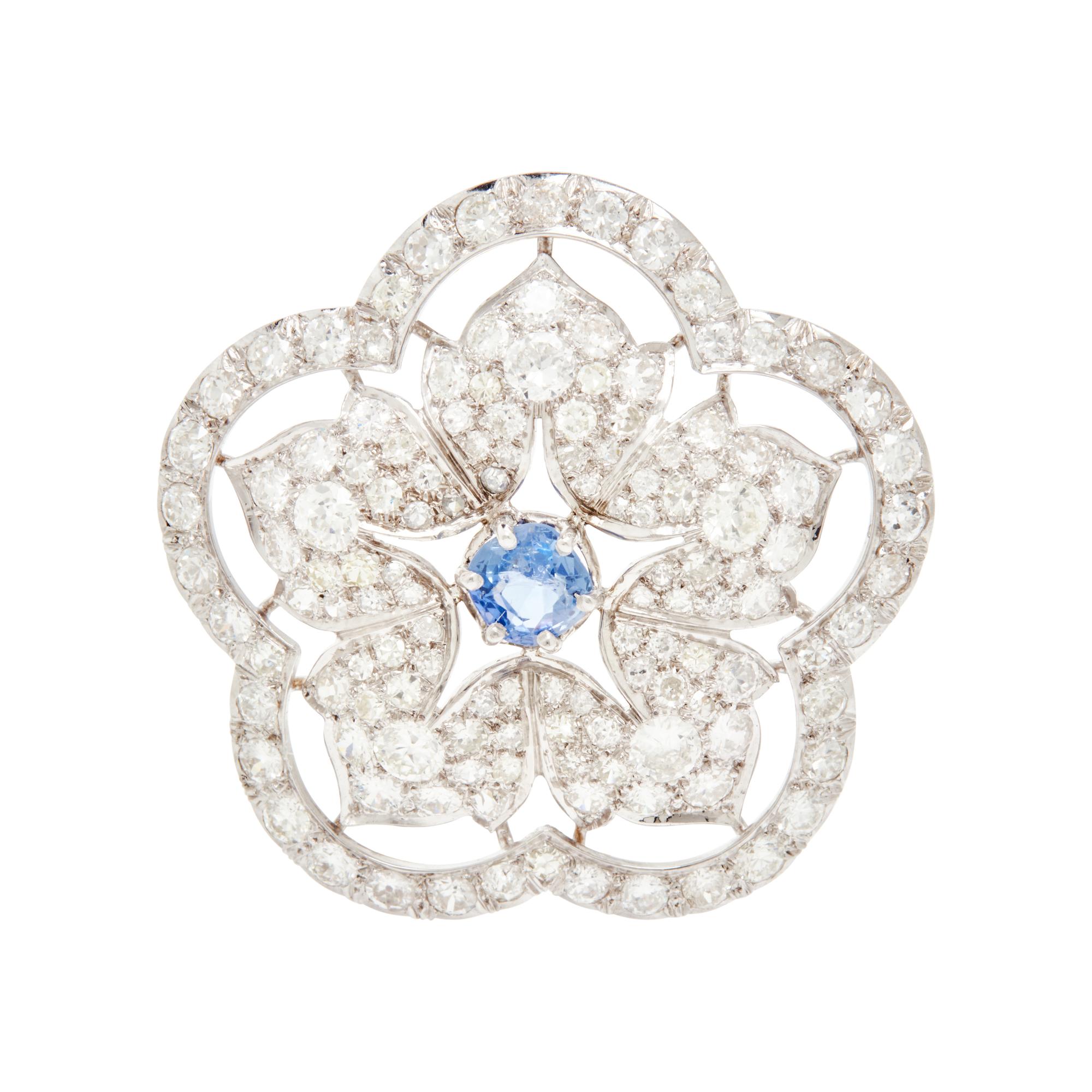 PLATINUM, DIAMOND, AND SAPPHIRE BROOCH