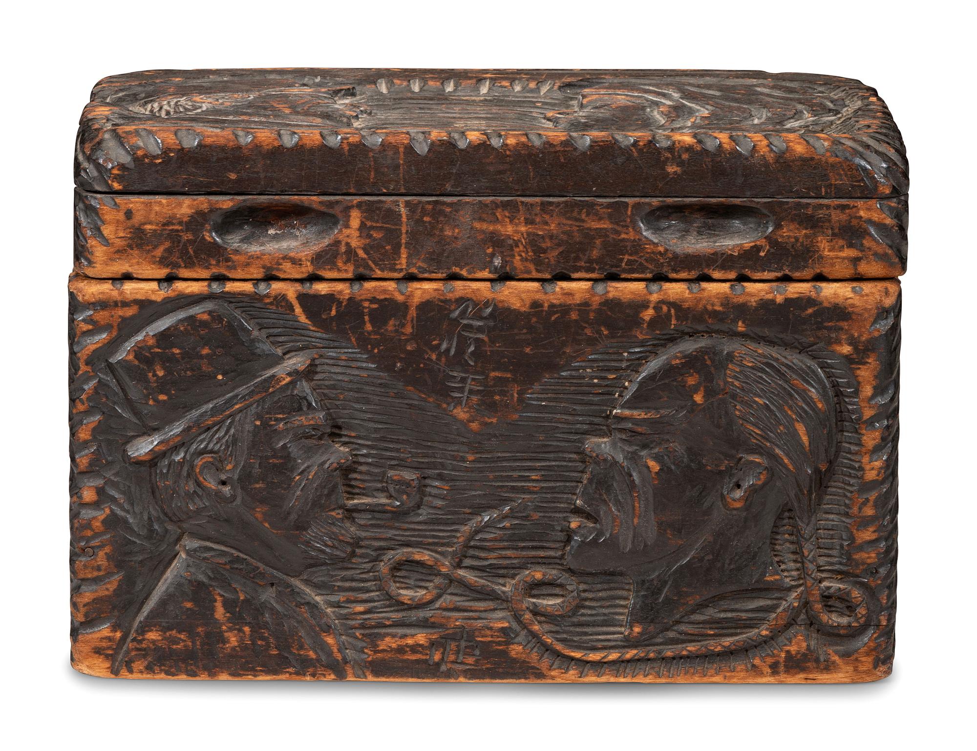 A Folk Art Carved and Stained Pine Tea or Tobacco Storage Box