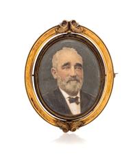 A Victorian Gilt Metal Portrait Brooch Height 2 7/8 inches.