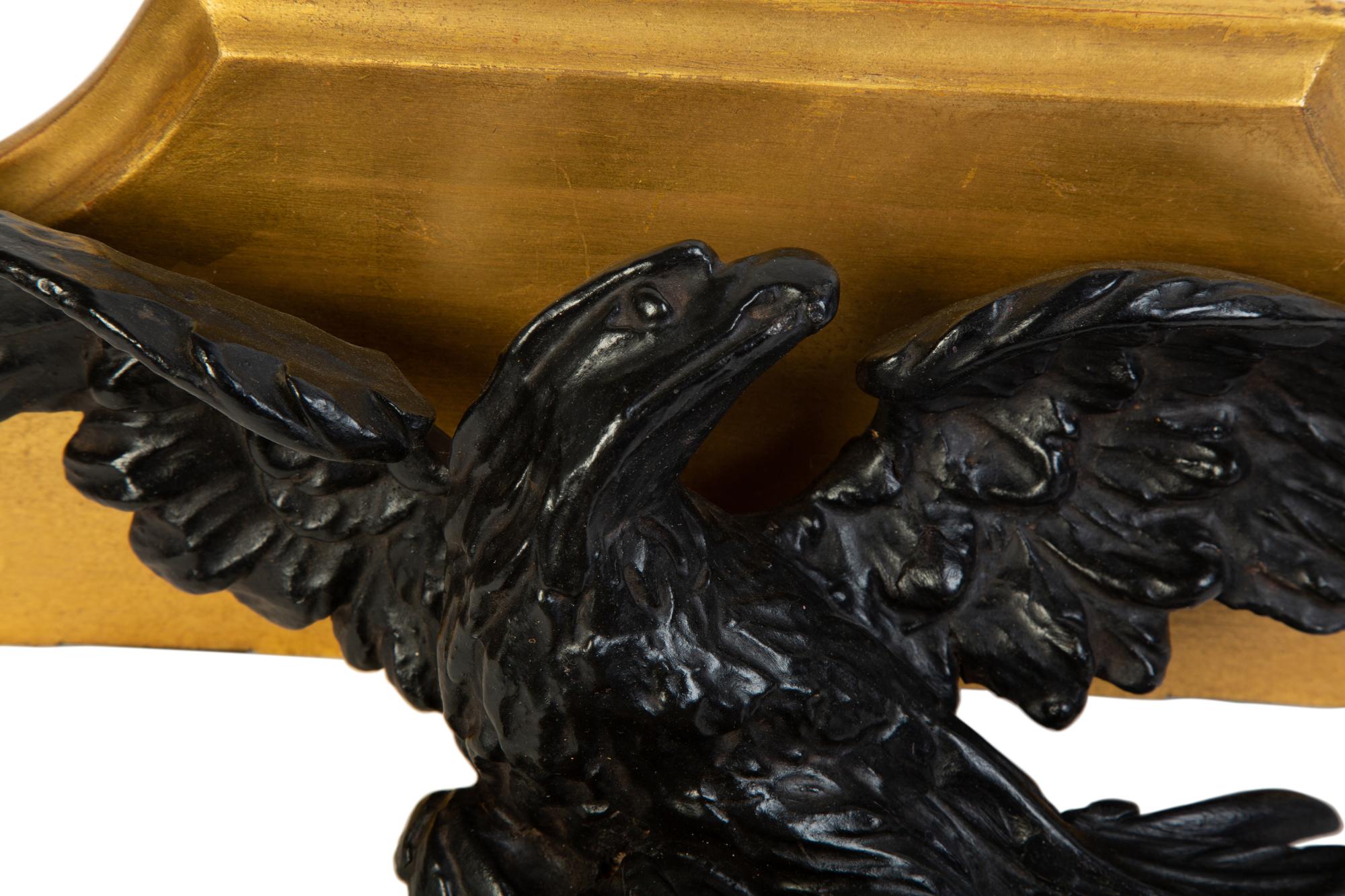 A Pair of Georgian Giltwood and Ebonized Carved Eagle Wall Brackets — EARLY 19TH CENTURY