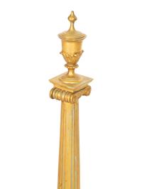 A Pair of Continental Gilt Bronze Chenets and an Associated Fire Screen