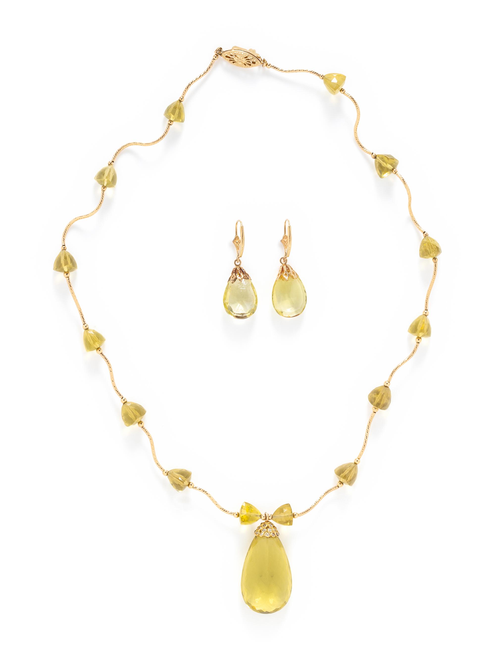 COLLECTION OF YELLOW GOLD AND HELIODOR JEWELRY