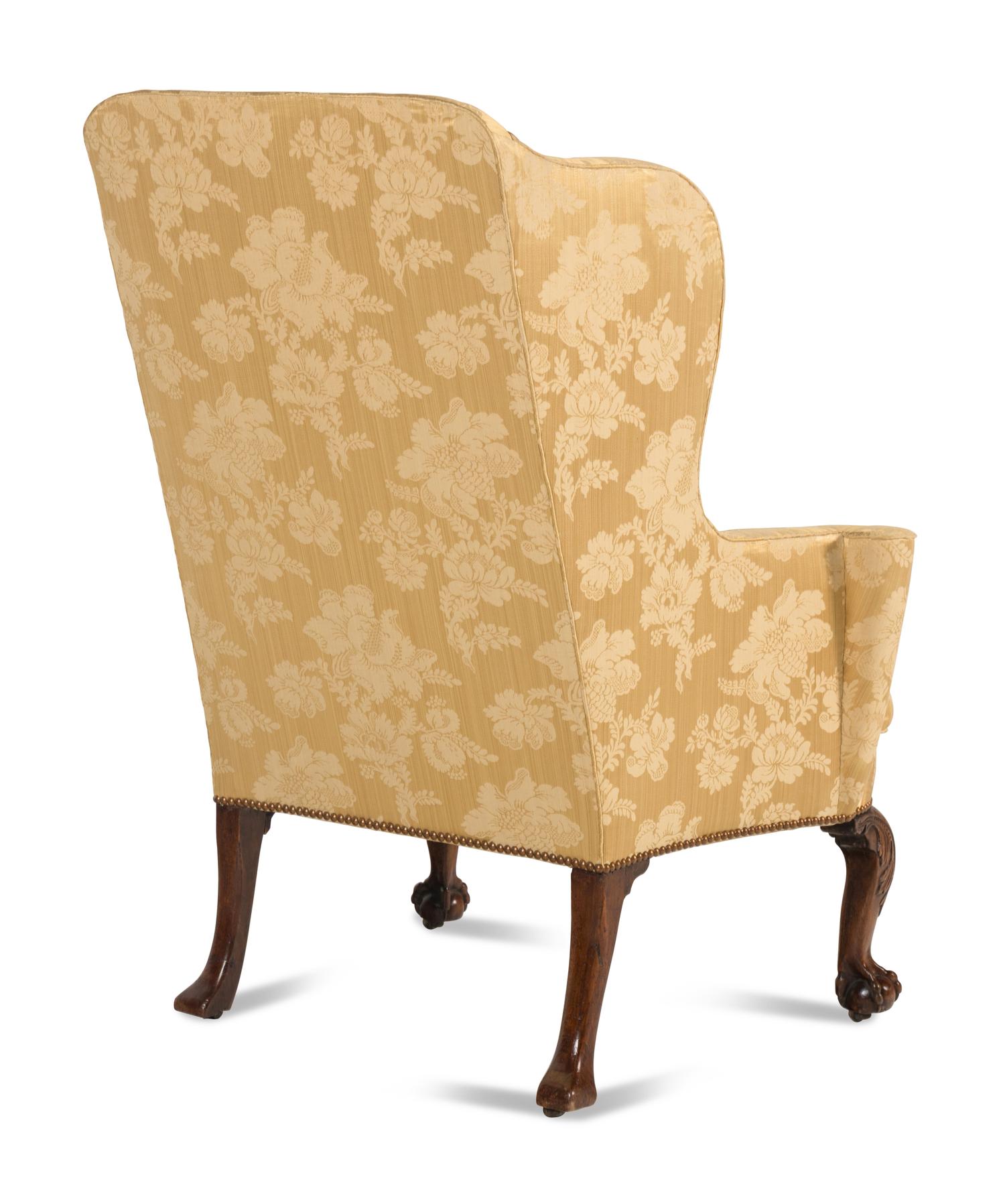 A George II Walnut Wingback Armchair