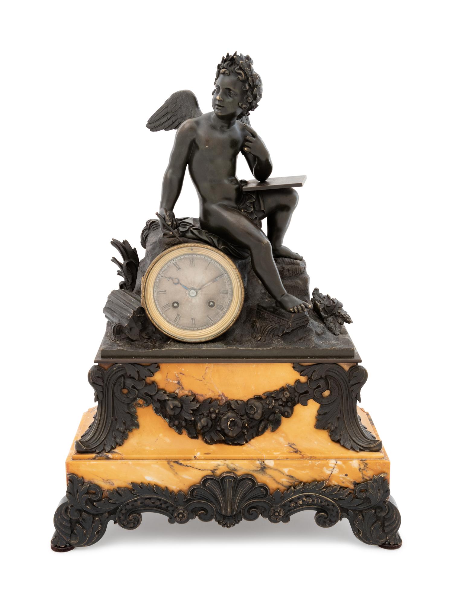 A French Bronze and Sienna Marble Figural Mantel Clock
