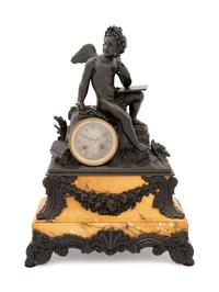 A French Bronze and Sienna Marble Figural Mantel Clock