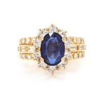 An 18 Karat Yellow Gold, Sapphire and Diamond Ring, 6.10 dwts.