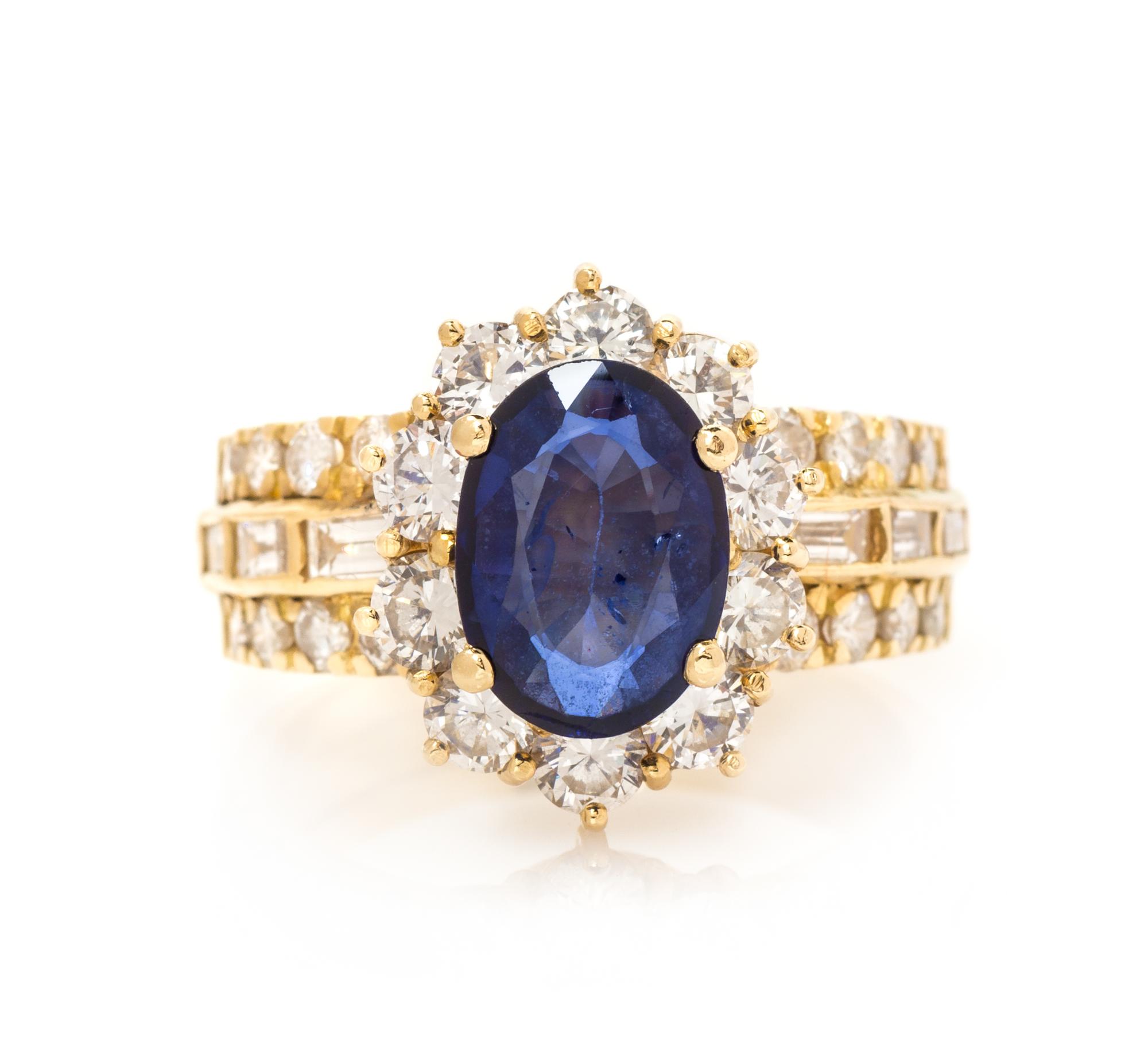 An 18 Karat Yellow Gold, Sapphire and Diamond Ring, 6.10 dwts.