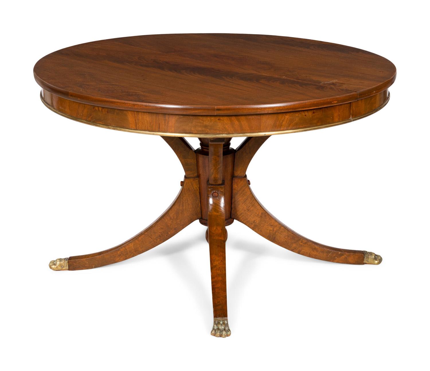 A Regency Mahogany Brass Mounted Extendable Pedestal Table