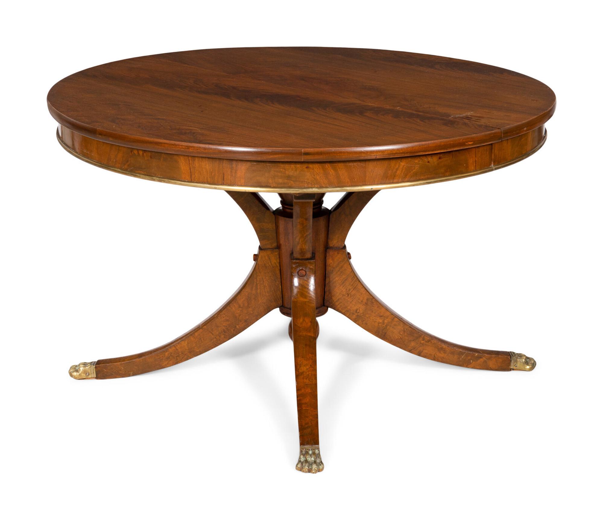 A Regency Mahogany Brass Mounted Extendable Pedestal Table