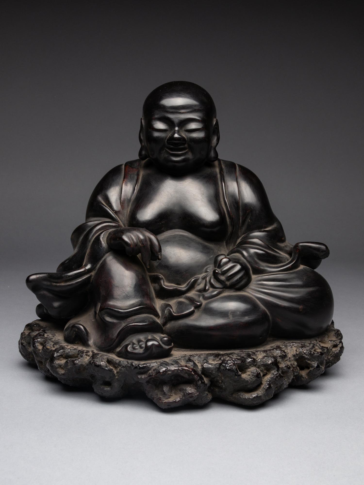 A Black Lacquered 'Jiazhu' Figure of Budai Buddha