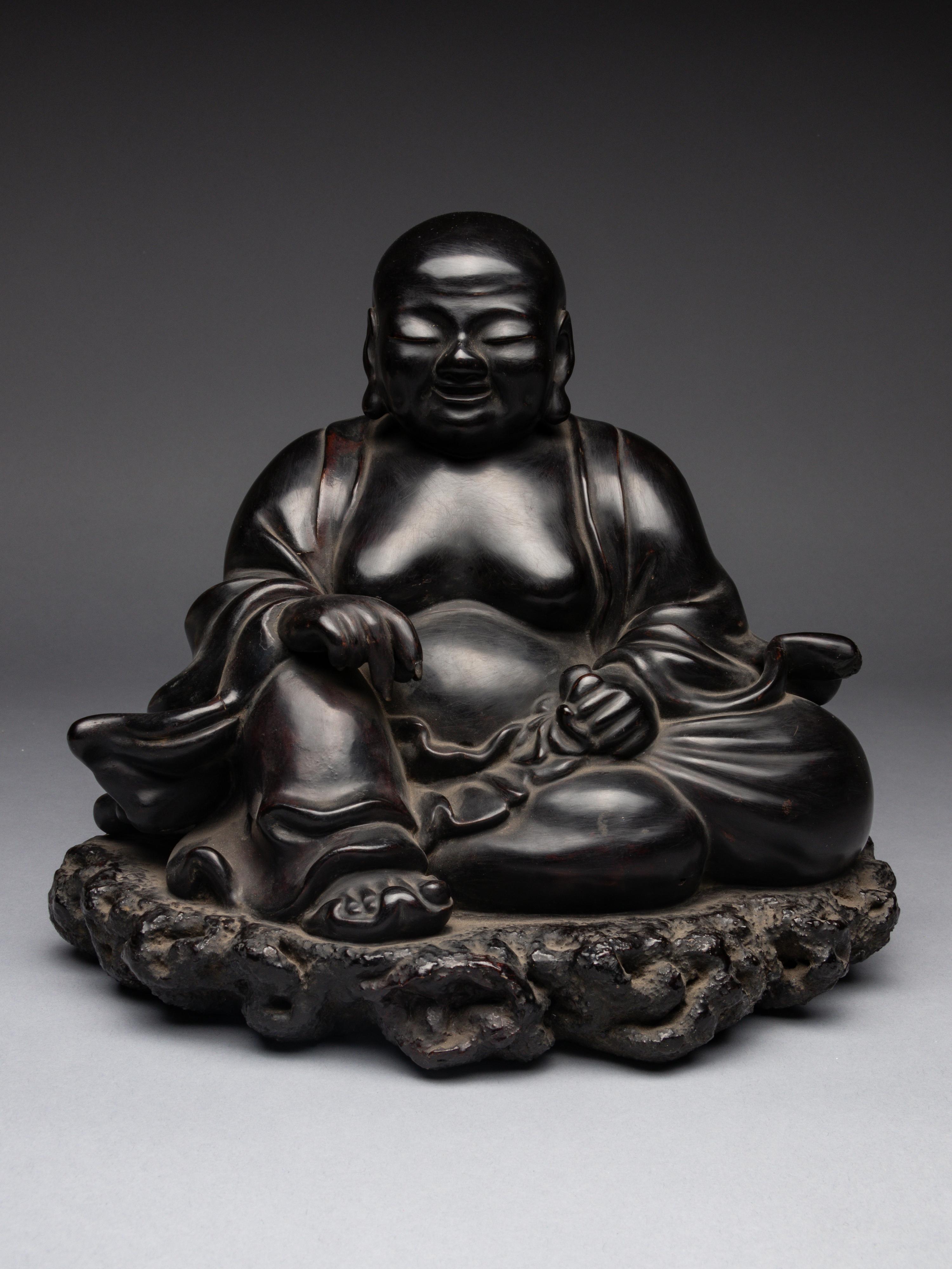 A Black Lacquered 'Jiazhu' Figure of Budai Buddha