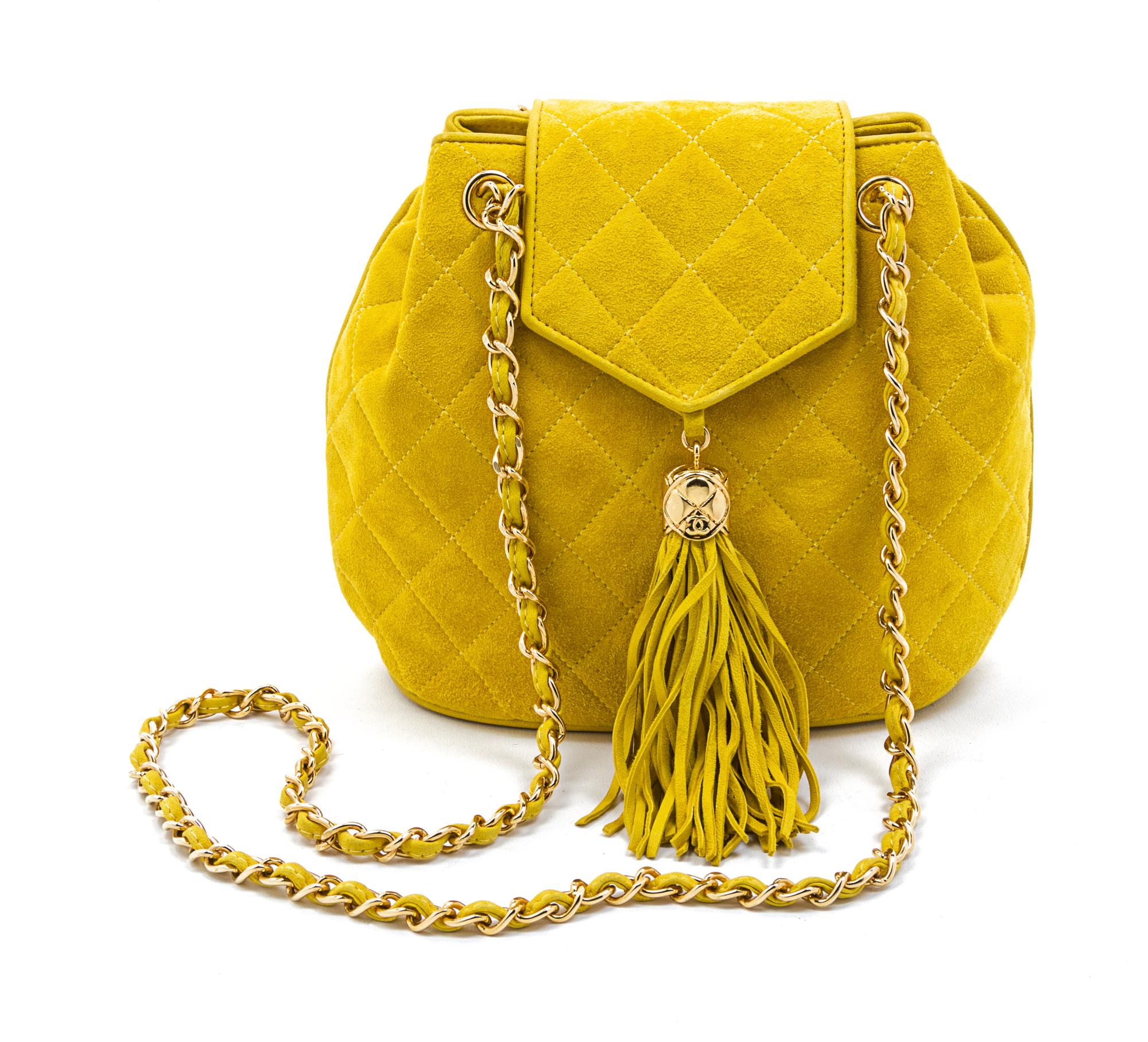 A Chanel Yellow Quilted Suede Bag, 8 1/2 x 7 x 3 inches.