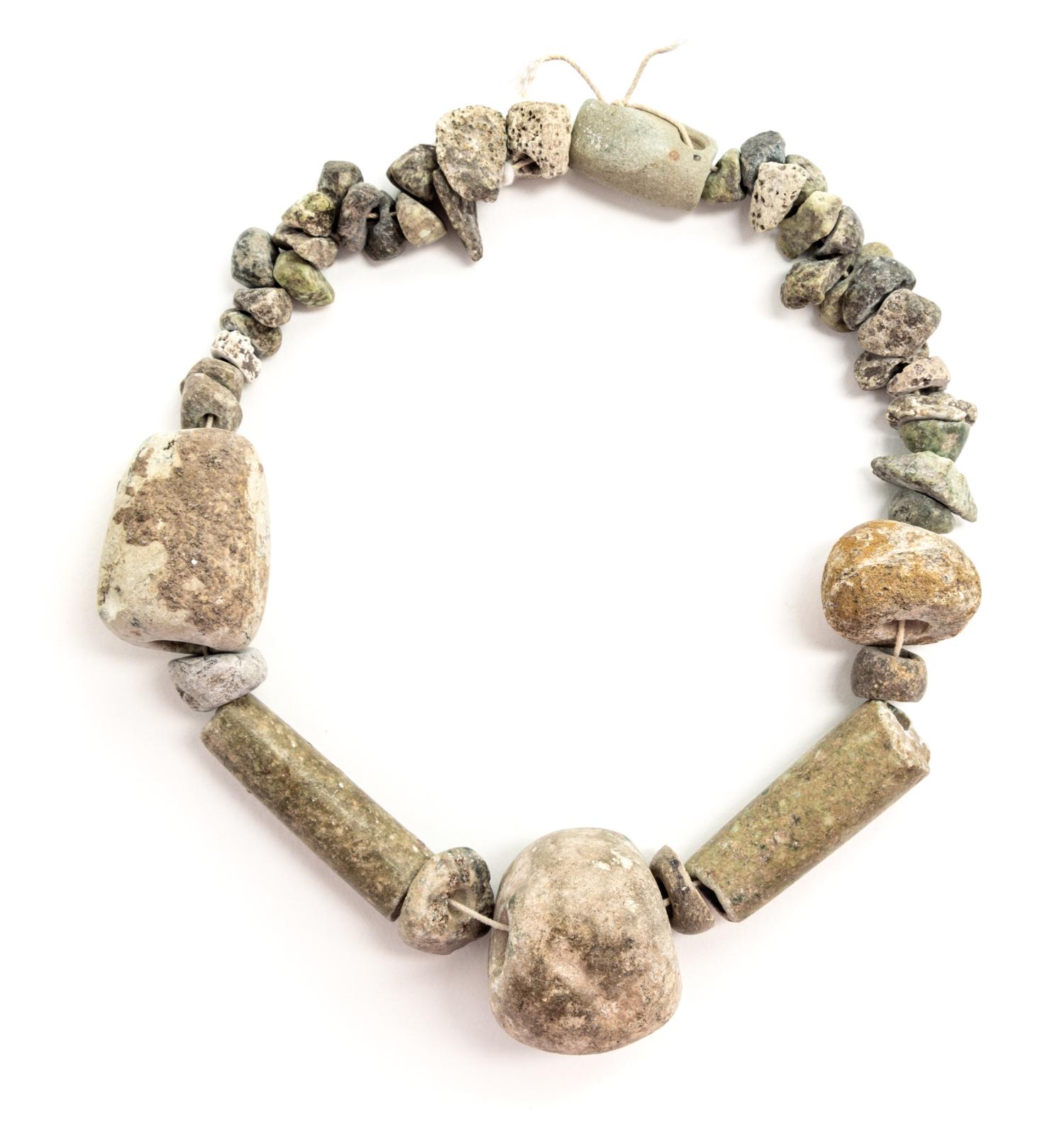An Egyptian Stone Necklace. Length overall 13 1/2 inches.