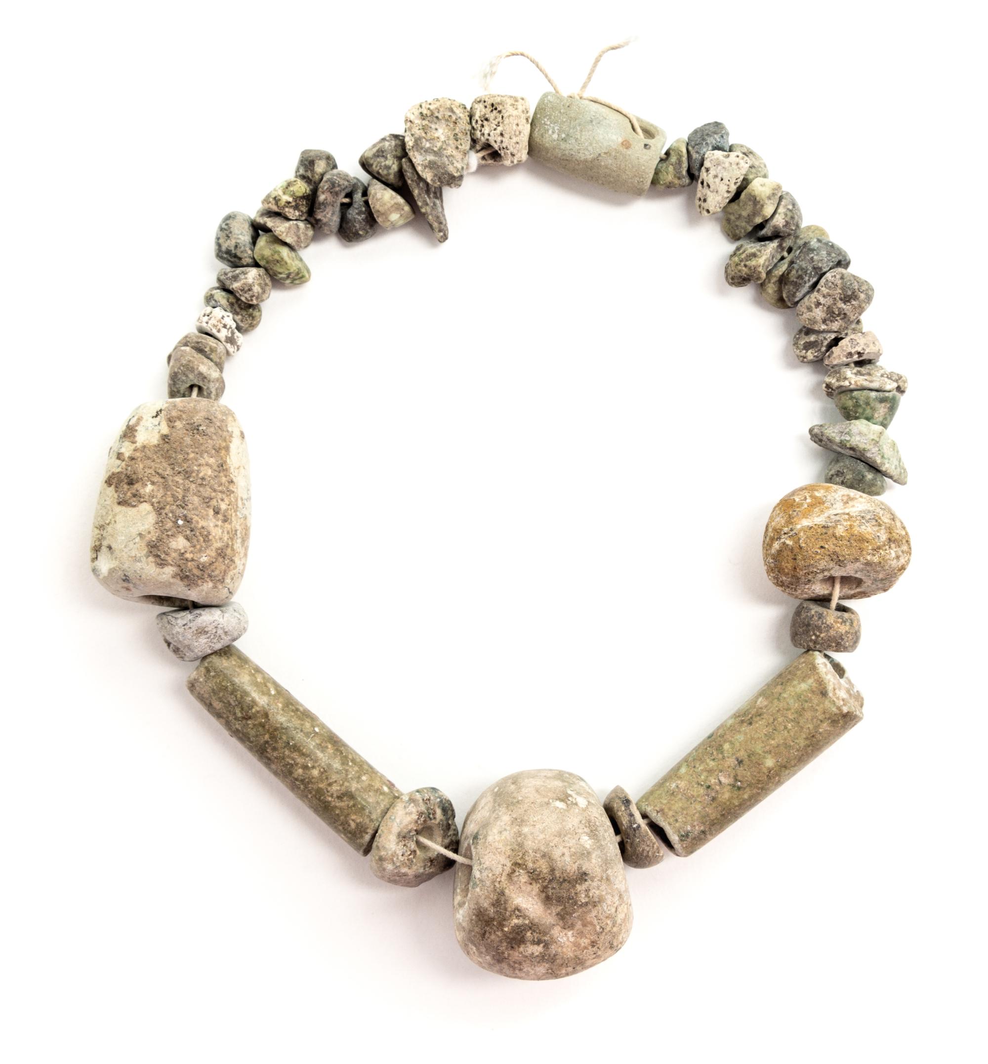 An Egyptian Stone Necklace. Length overall 13 1/2 inches.