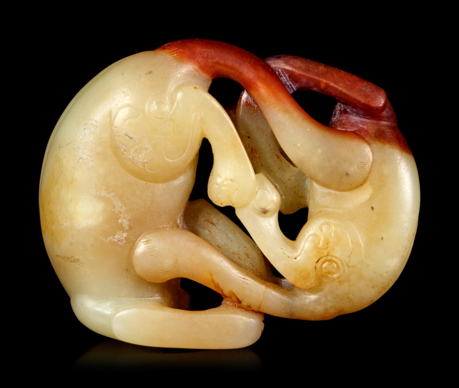 A Yellow and Russet Jade Carving of Double Badger