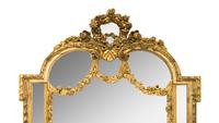A Large Rococo Style Giltwood Mirror