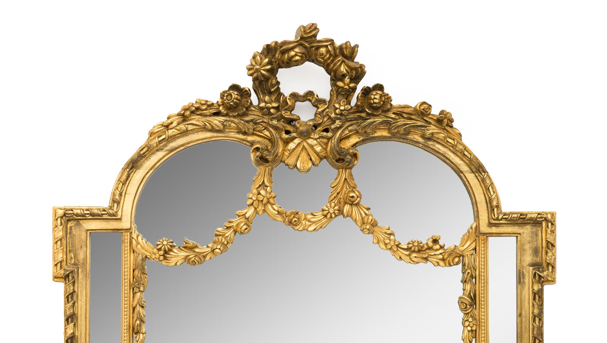 A Large Rococo Style Giltwood Mirror