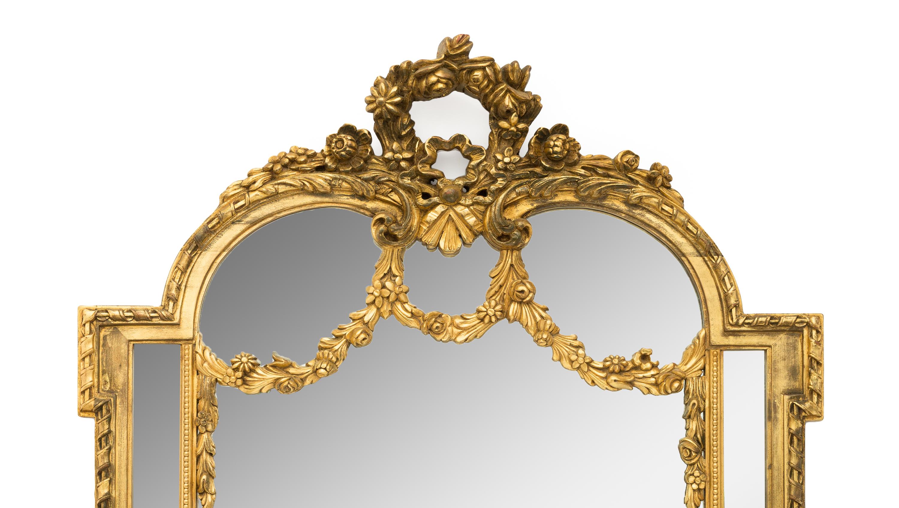 A Large Rococo Style Giltwood Mirror