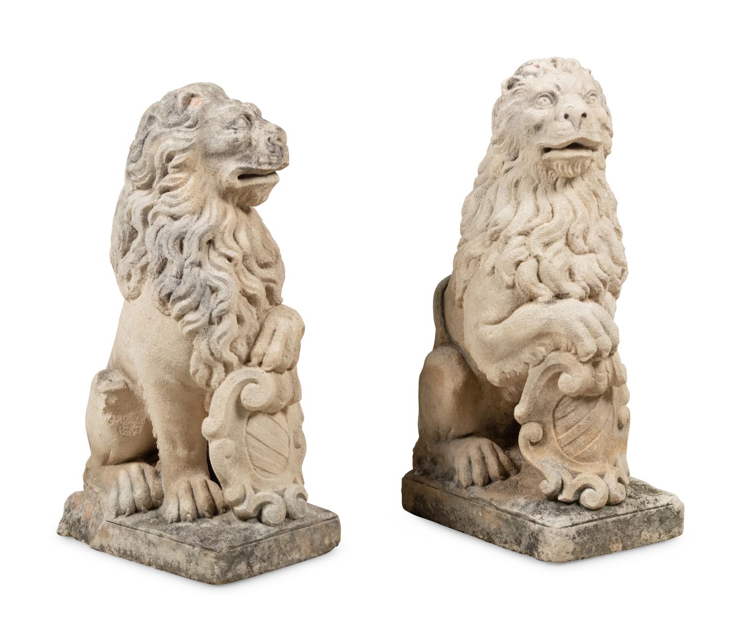 A Pair of Cast Stone Model Lions