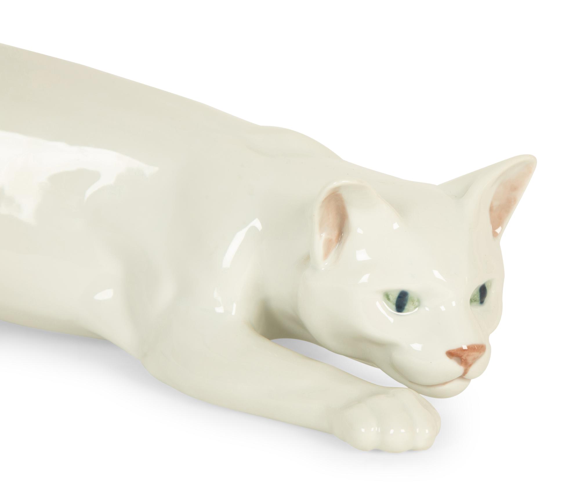 A Royal Copenhagen Porcelain Figure of a Crawling Cat