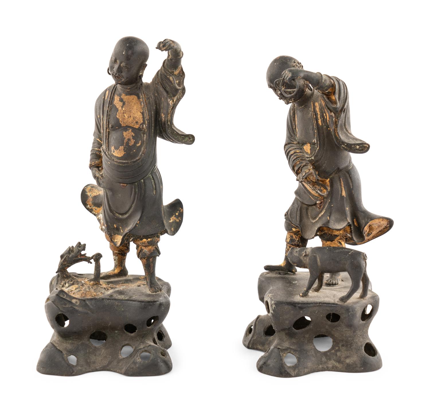 A Pair of Chinese Parcel-Gilt Bronze Figures of Luohan