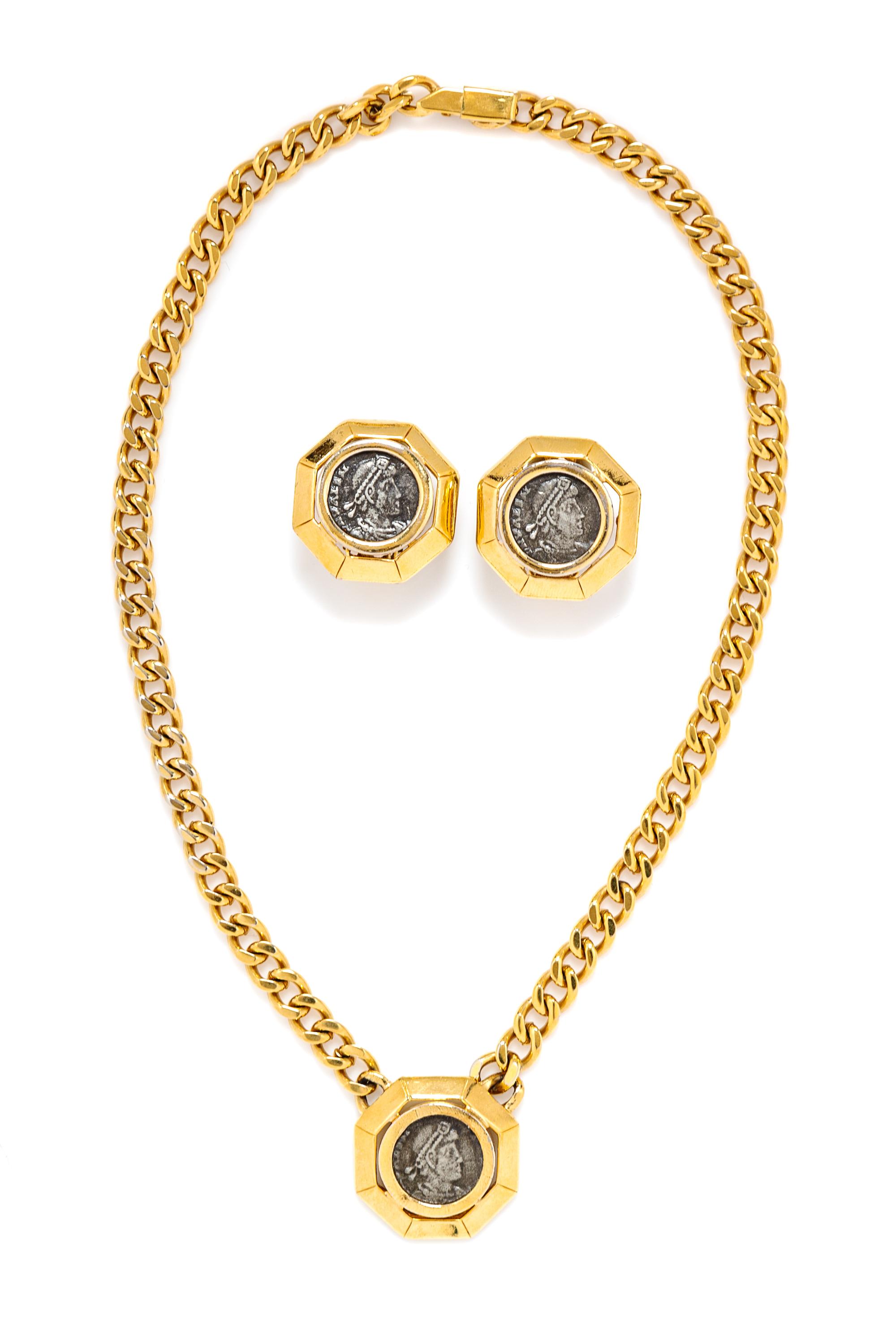 A Ciner Goldtone Coin Demi Parure, 15.5" L; Pendant and Earclips: 1" diameter.