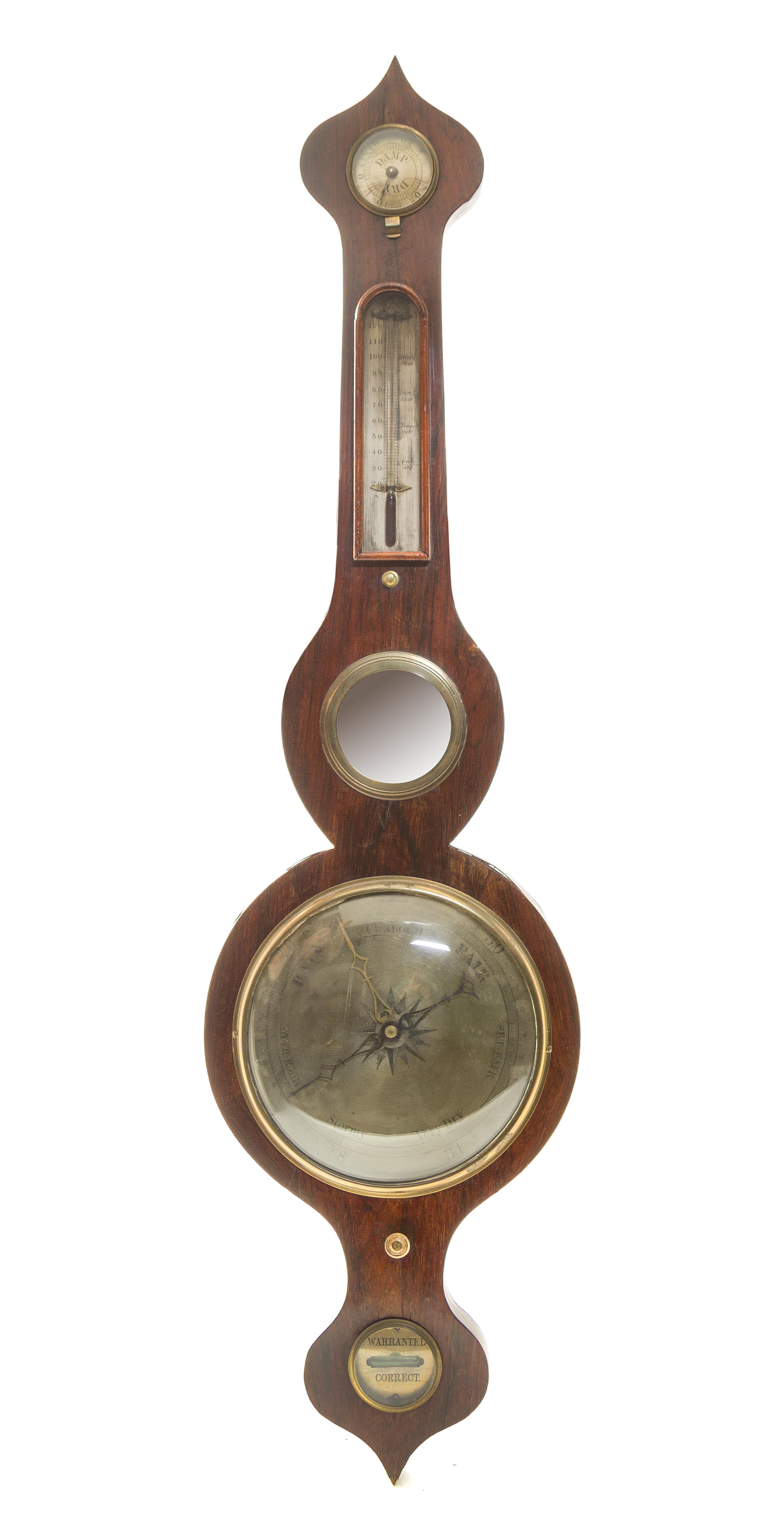 An English Mahogany Wheel Barometer, Height 38 1/2 inches.