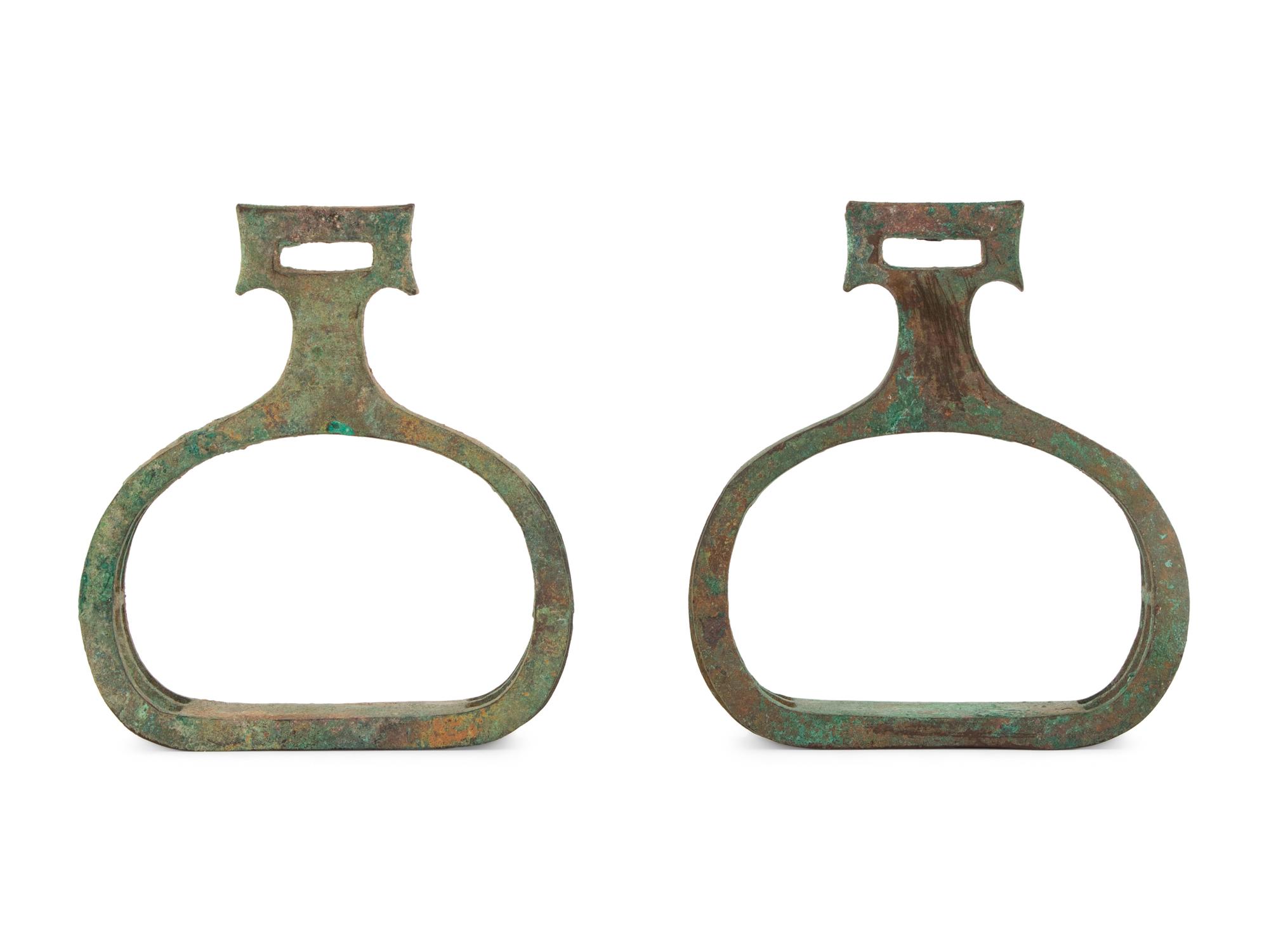 A Chinese Bronze Pair of Stirrups