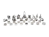 A Collection of Silver and Silver-Plate Napkin Rings