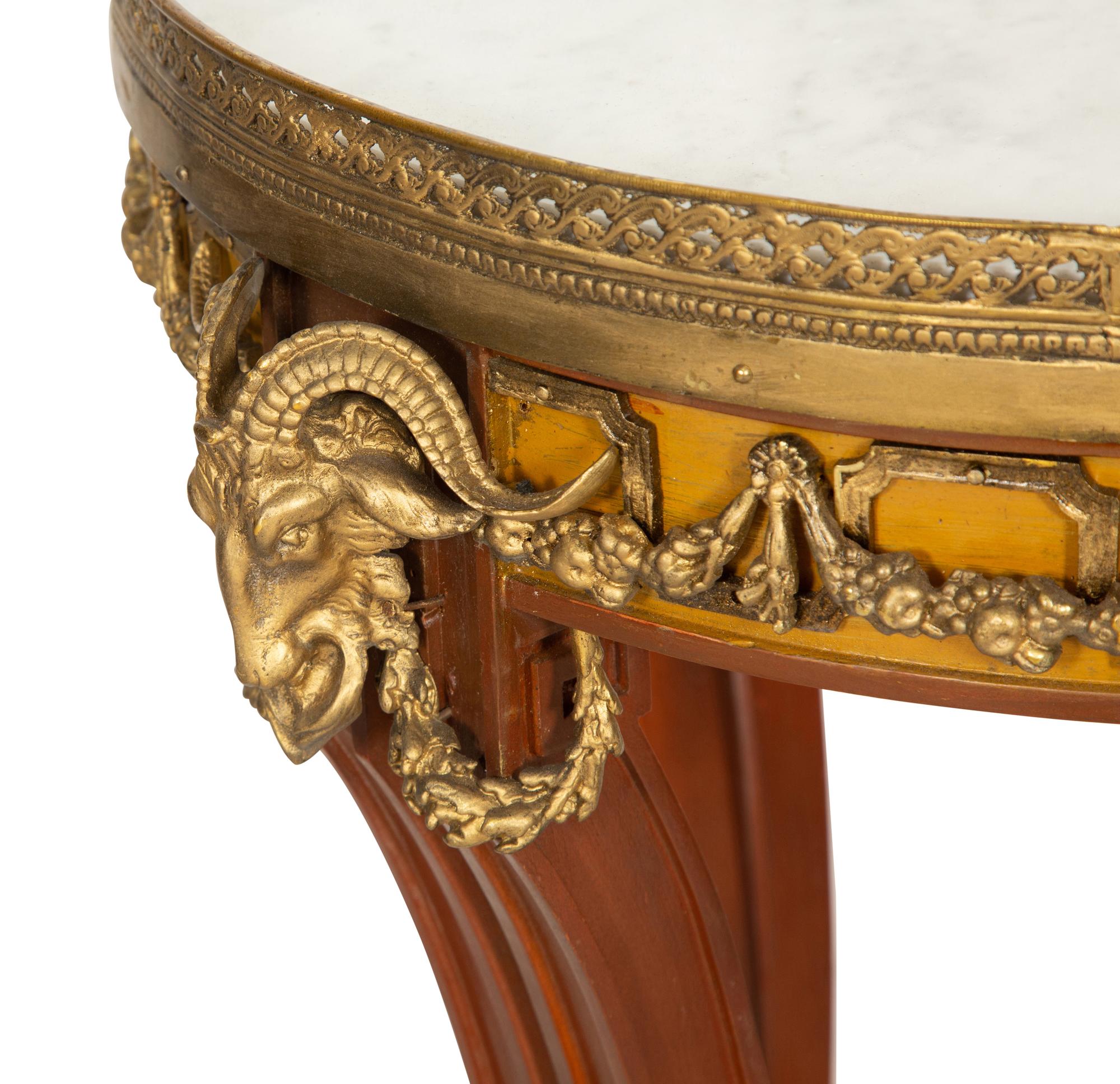A Pair of Louis XVI Style Gilt Metal Mounted Walnut Gueridons