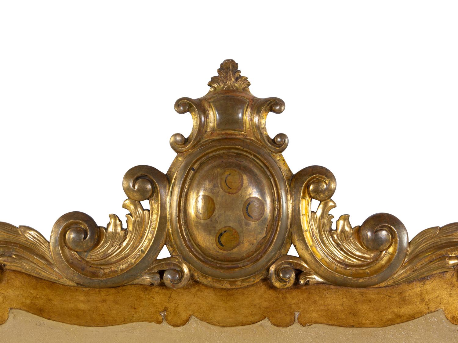 A Continental Carved Giltwood Headboard