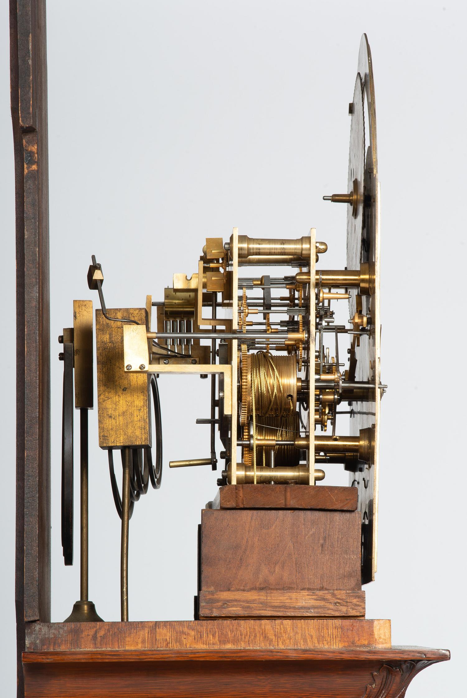 A Winterhalder and Hofmeier Oak Tall Case Clock