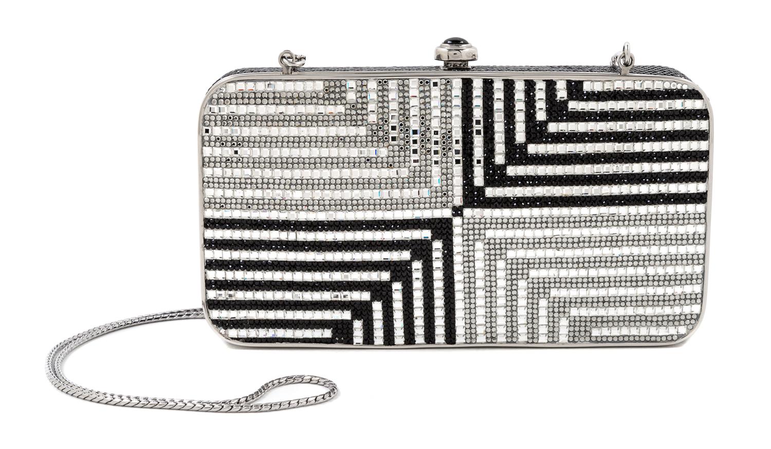 A Judith Leiber Oblong Black and White Minaudiere, 3.5" x 1.25" x 6.5"; Strap drop: 20".