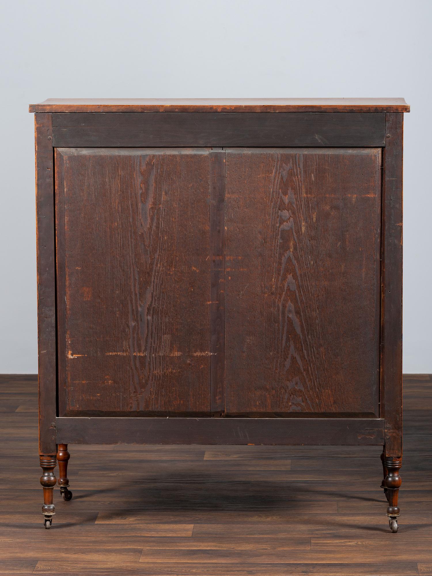 A Federal Inlaid and Turned Cherrywood Chest of Drawers