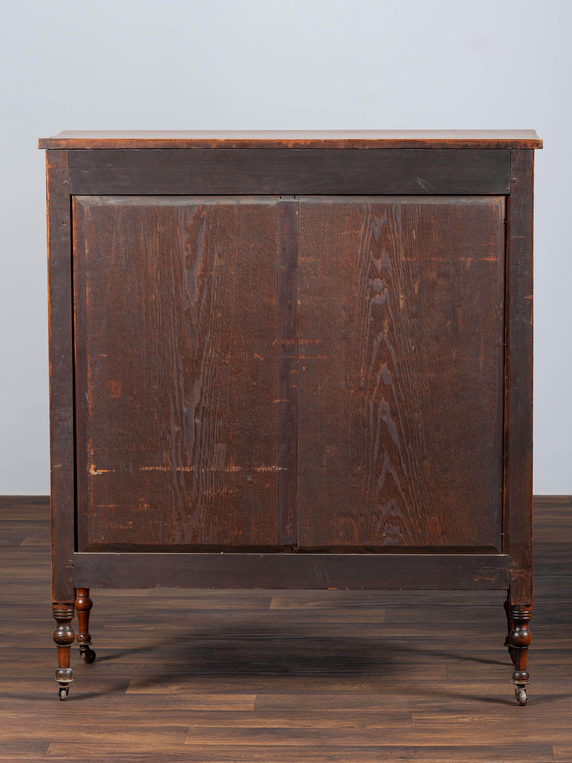 A Federal Inlaid and Turned Cherrywood Chest of Drawers