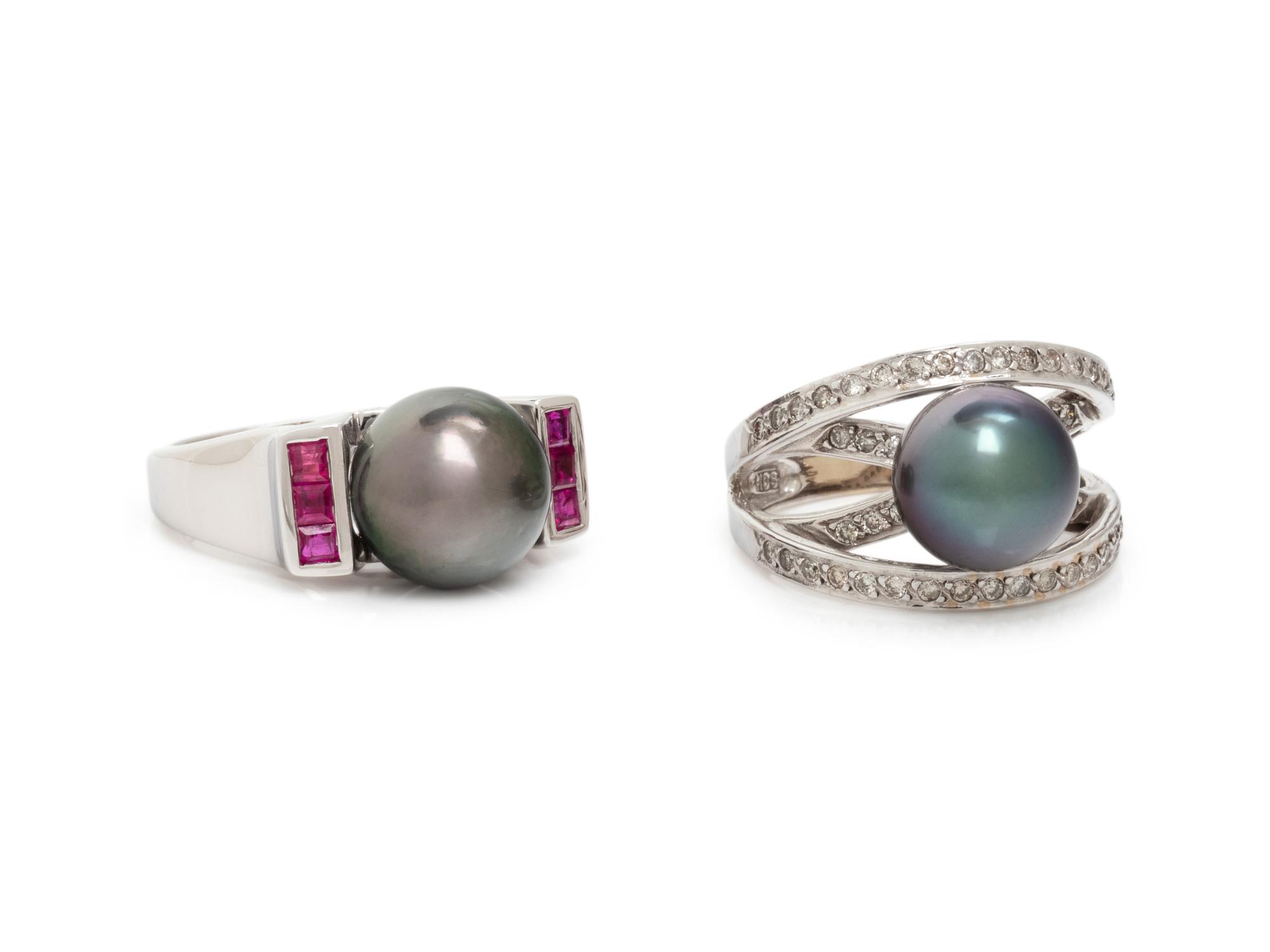 A COLLECTION OF WHITE GOLD AND CULTURED PEARL RINGS